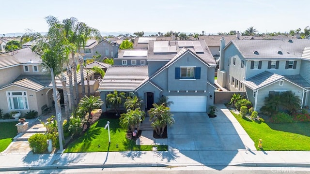 7607 Corona Valley Ave, Eastvale, CA 92880 - view of front of house featuring a residential view, stucco siding, concrete driveway, and an attached garage