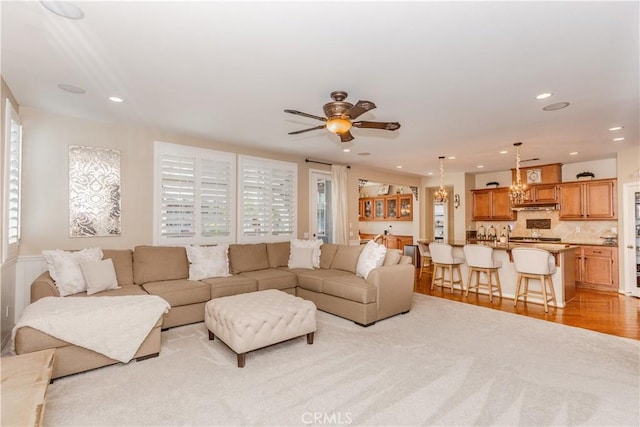 7607 Corona Valley Ave, Eastvale, CA 92880 - living room with a ceiling fan, recessed lighting, and light wood-style flooring