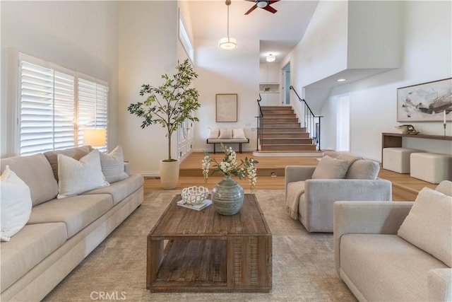 3802 E Summitridge Ln, Orange, CA 92867 - living area featuring plenty of natural light, a high ceiling, and a ceiling fan