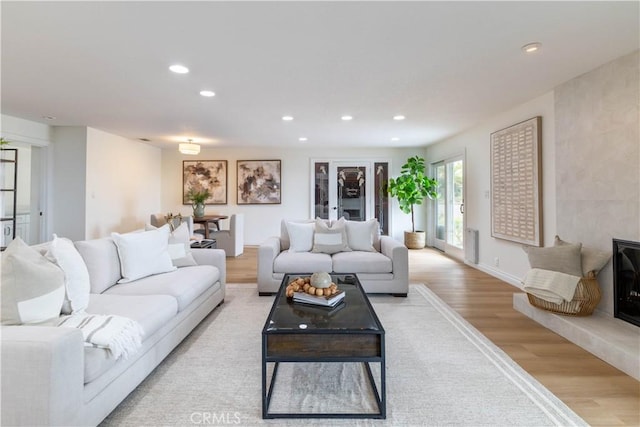 3802 E Summitridge Ln, Orange, CA 92867 - living room with recessed lighting and light wood-style flooring