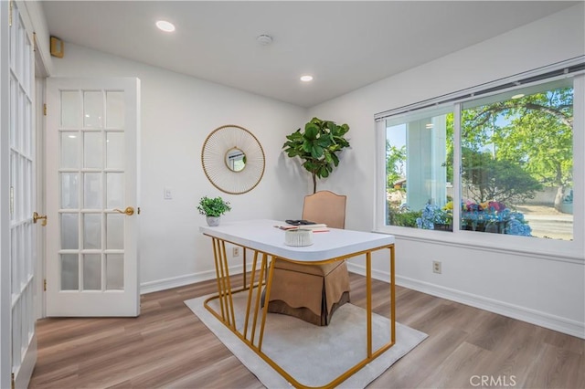 home office with baseboards, wood finished floors, and recessed lighting