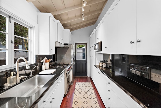 1056 Glenneyre St, Laguna Beach, CA 92651 - kitchen featuring stainless steel stove, a sink, vaulted ceiling with beams, wooden ceiling, and under cabinet range hood
