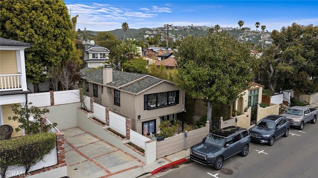 1056 Glenneyre St, Laguna Beach, CA 92651 - view of building exterior with a mountain view, a residential view, and fence private yard