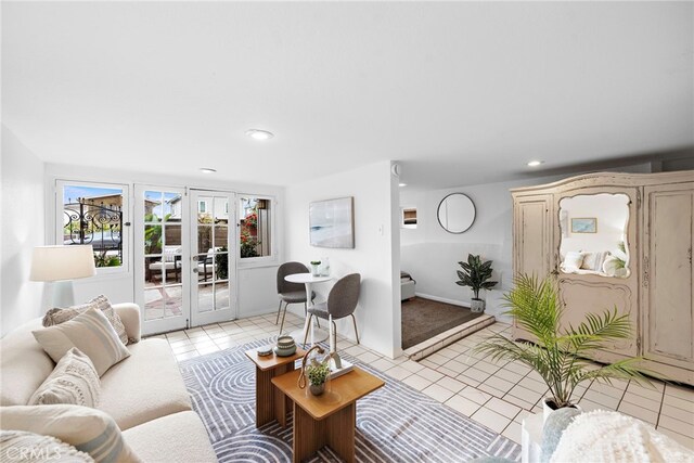 1056 Glenneyre St, Laguna Beach, CA 92651 - living room featuring light tile patterned flooring, french doors, and recessed lighting