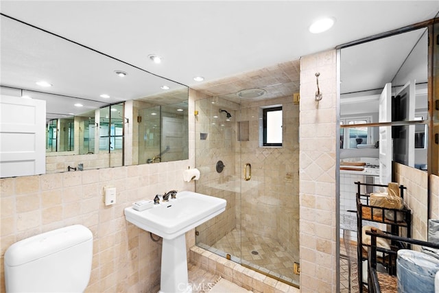 1056 Glenneyre St, Laguna Beach, CA 92651 - bathroom featuring tile walls, recessed lighting, a shower stall, and toilet