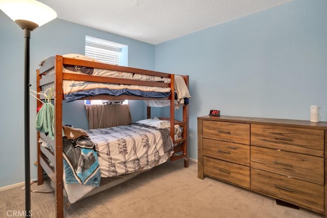 11568 Luanda St, Lakeview Terrace, CA 91342 - bedroom featuring light colored carpet, a textured ceiling, and baseboards
