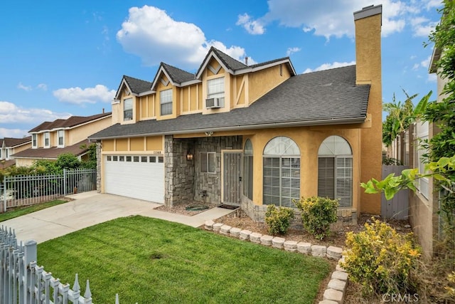11568 Luanda St, Lakeview Terrace, CA 91342 - view of front facade with driveway, stone siding, stucco siding, an attached garage, and roof with shingles