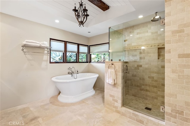 bathroom featuring beamed ceiling, a soaking tub, a stall shower, and recessed lighting