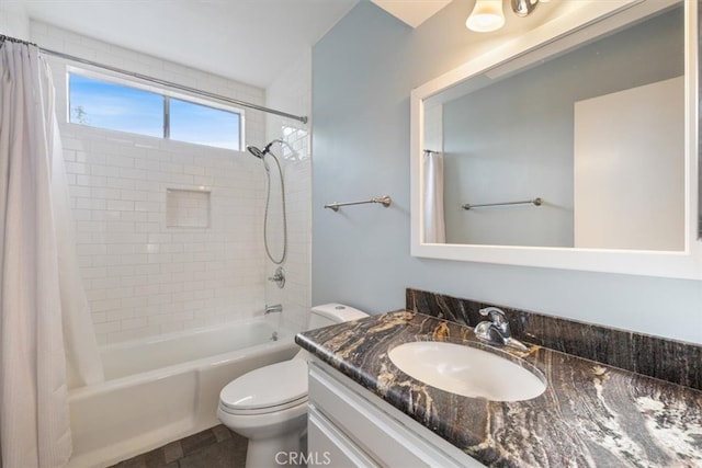 full bathroom with shower / tub combo, toilet, and vanity