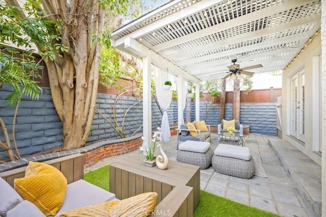 view of patio with a pergola, an outdoor hangout area, a ceiling fan, and a fenced backyard