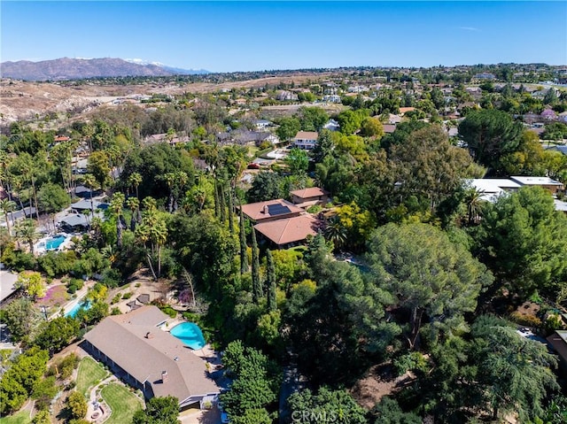 bird's eye view with a residential view and a mountain view