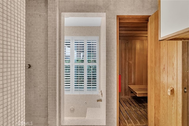 view of sauna with wallpapered walls