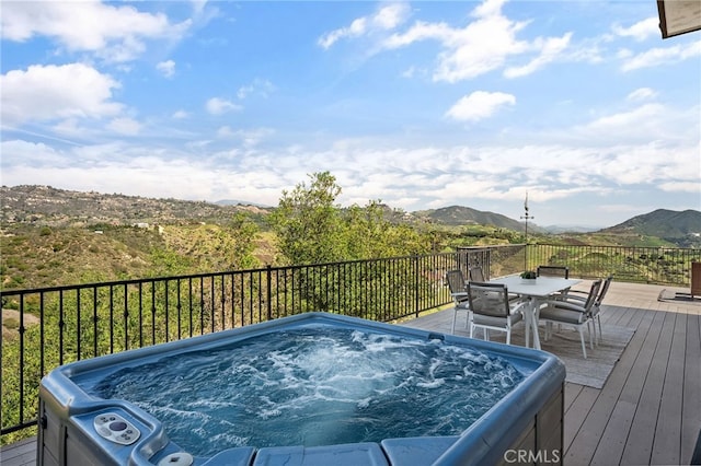4385 Rainbow Vista Dr, Fallbrook, CA 92028 - wooden terrace with a hot tub, outdoor dining space, and a mountain view