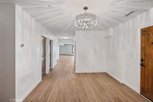4385 Rainbow Vista Dr, Fallbrook, CA 92028 - foyer entrance featuring light wood-style floors, baseboards, and a chandelier