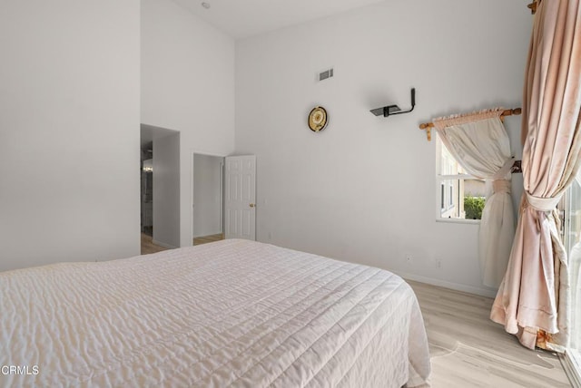964 Vista Pointe Pl, Santa Paula, CA 93060 - bedroom featuring high vaulted ceiling, light wood-type flooring, visible vents, and baseboards