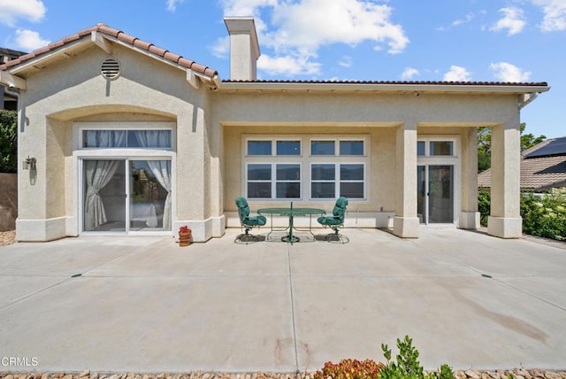 964 Vista Pointe Pl, Santa Paula, CA 93060 - back of house with a patio area, a chimney, and stucco siding