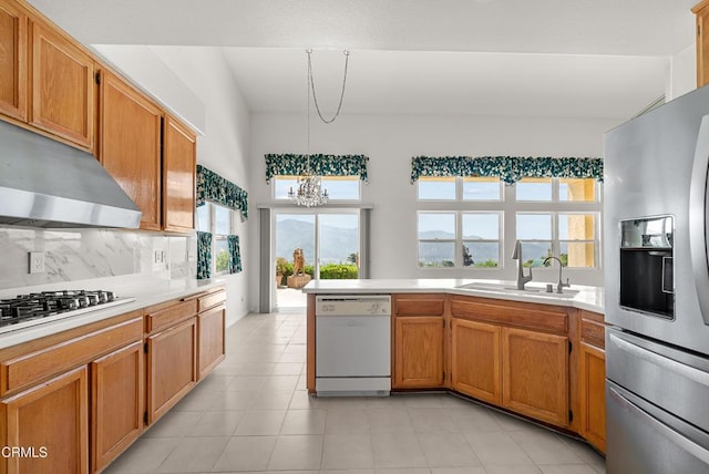 964 Vista Pointe Pl, Santa Paula, CA 93060 - kitchen with white dishwasher, a sink, gas cooktop, a chandelier, and stainless steel fridge with ice dispenser