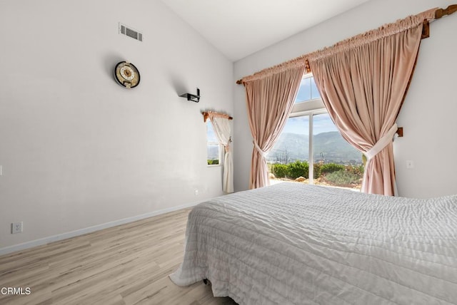 964 Vista Pointe Pl, Santa Paula, CA 93060 - bedroom with light wood-type flooring, a mountain view, baseboards, access to outside, and visible vents