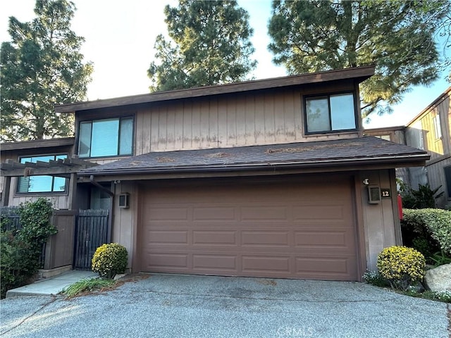 garage featuring driveway