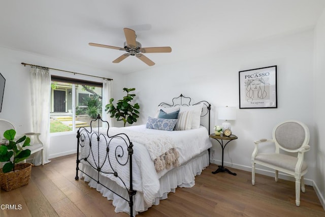 599 Rio Grande Cir, Thousand Oaks, CA 91360 - bedroom with baseboards, a ceiling fan, and wood finished floors