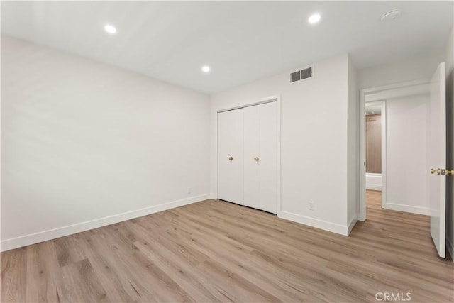 600 W Stocker St Unit 303, Glendale, CA 91202 - unfurnished bedroom with baseboards, light wood-style flooring, recessed lighting, and a closet