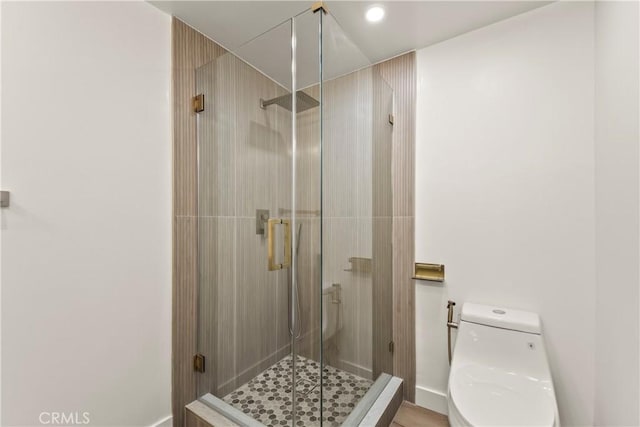 600 W Stocker St Unit 303, Glendale, CA 91202 - full bathroom with toilet, a stall shower, and baseboards