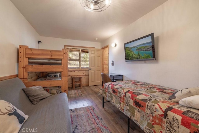 bedroom featuring wood finished floors
