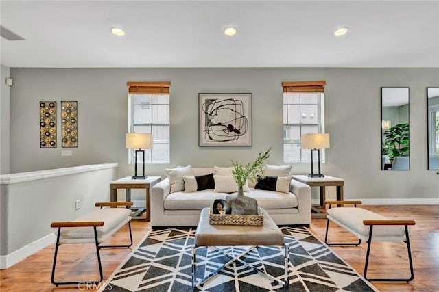 living area with recessed lighting and plenty of natural light