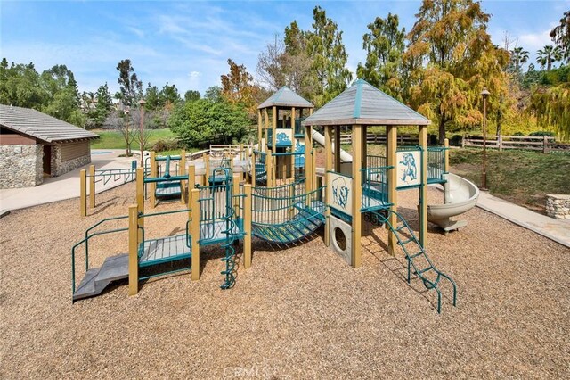 community jungle gym with fence