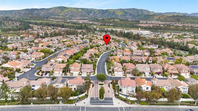 aerial view with a mountain view and a residential view