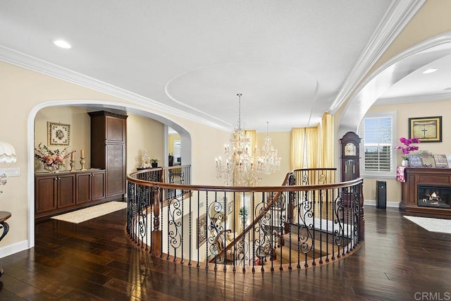 2831 Shenandoah Dr, Chula Vista, CA 91914 - hallway featuring an upstairs landing, a chandelier, dark wood-type flooring, crown molding, and recessed lighting
