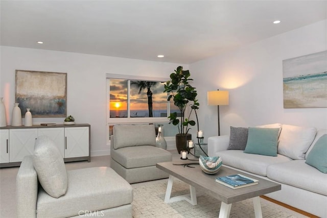 living room with baseboards and recessed lighting