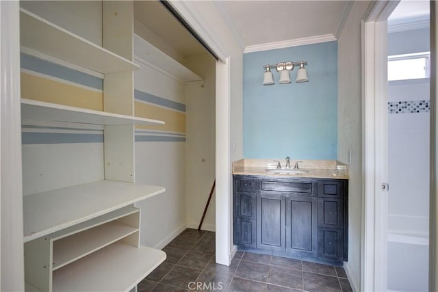 8920 Arcade Rd, Atascadero, CA 93422 - bathroom featuring ornamental molding, vanity, and tile patterned floors