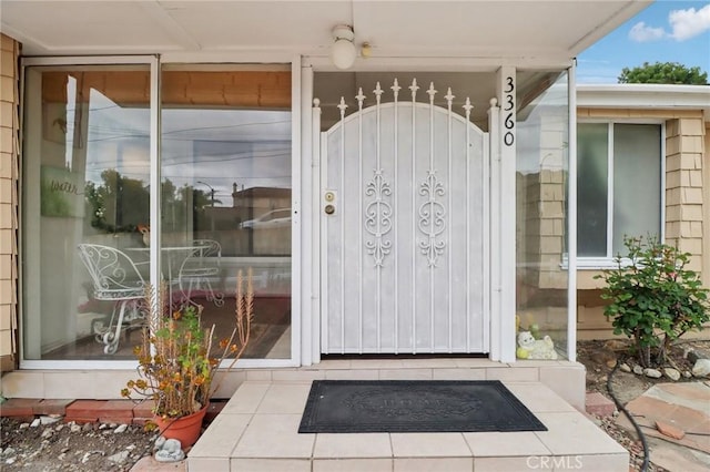 doorway to property with a gate