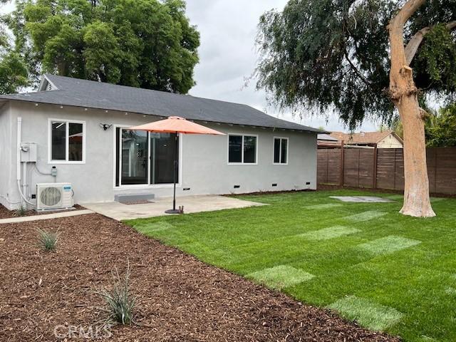1333 Lancewood Ave, Hacienda Heights, CA 91745 - rear view of house with ac unit, stucco siding, a patio, and crawl space