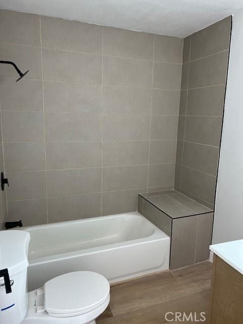 1333 Lancewood Ave, Hacienda Heights, CA 91745 - full bath with wood finished floors, vanity, bathing tub / shower combination, and toilet