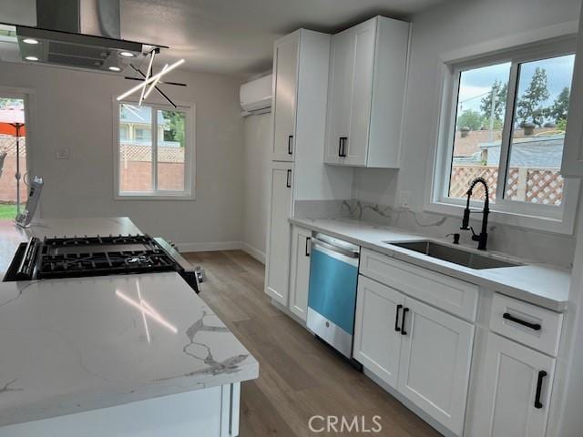 1333 Lancewood Ave, Hacienda Heights, CA 91745 - kitchen featuring dishwasher, a sink, exhaust hood, light wood-style flooring, and white cabinetry