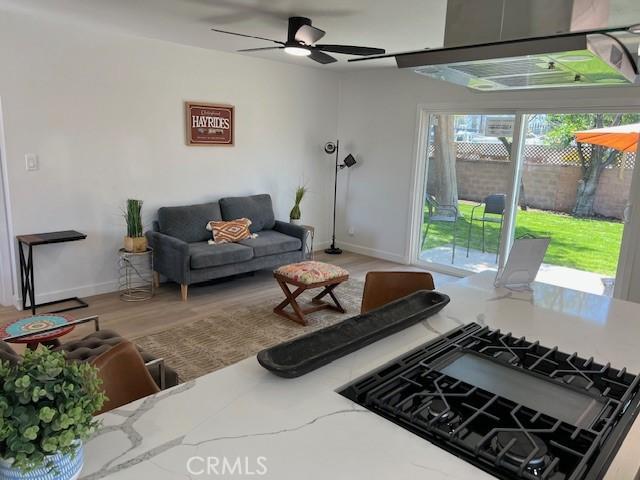 1333 Lancewood Ave, Hacienda Heights, CA 91745 - living room with a ceiling fan, baseboards, and wood finished floors