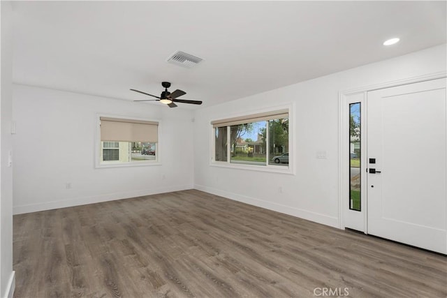 6130 Myrtle Ave, Long Beach, CA 90805 - foyer with visible vents, a ceiling fan, baseboards, and wood finished floors