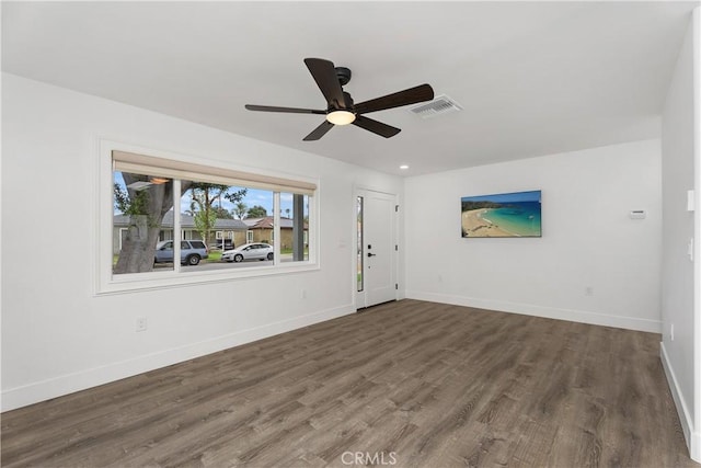 6130 Myrtle Ave, Long Beach, CA 90805 - unfurnished living room featuring baseboards, ceiling fan, wood finished floors, and visible vents