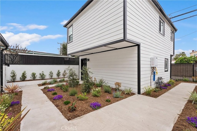 6130 Myrtle Ave, Long Beach, CA 90805 - view of property exterior with a patio and fence