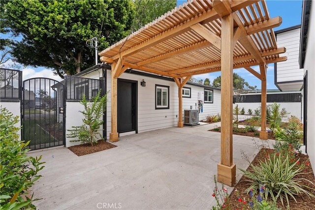 6130 Myrtle Ave, Long Beach, CA 90805 - view of patio / terrace with a gate, ac unit, and a pergola