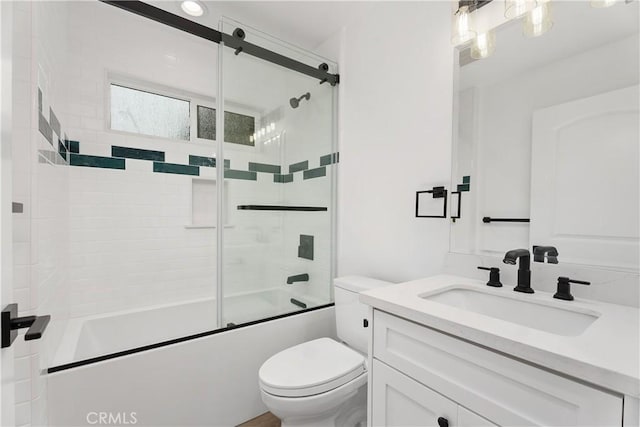 6130 Myrtle Ave, Long Beach, CA 90805 - bathroom with toilet, bath / shower combo with glass door, and vanity