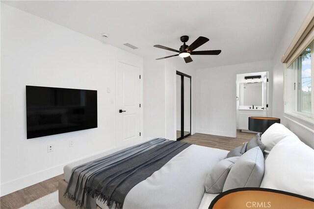 6130 Myrtle Ave, Long Beach, CA 90805 - bedroom featuring a ceiling fan, baseboards, visible vents, and wood finished floors