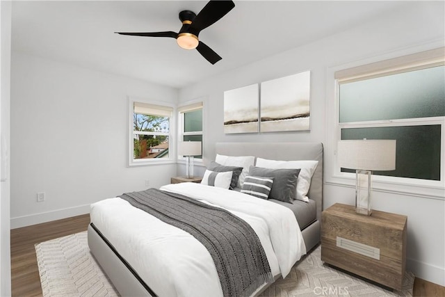 6130 Myrtle Ave, Long Beach, CA 90805 - bedroom with baseboards, ceiling fan, and wood finished floors
