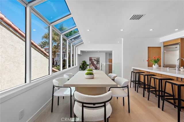 309 Carnation Ave Unit 4, Corona Del Mar, CA 92625 - dining space featuring light wood-style floors and recessed lighting