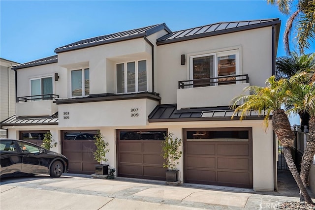 309 Carnation Ave Unit 4, Corona Del Mar, CA 92625 - view of front of house with a standing seam roof and a metal roof