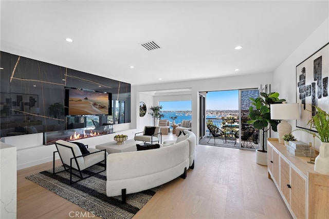 309 Carnation Ave Unit 4, Corona Del Mar, CA 92625 - living room featuring wood finished floors and recessed lighting