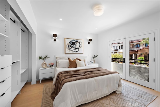 309 Carnation Ave Unit 4, Corona Del Mar, CA 92625 - bedroom featuring access to outside, light wood-style flooring, and recessed lighting