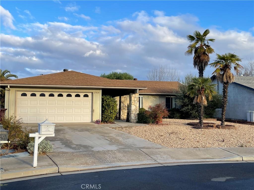 27028 Howard St, Menifee, CA 92586 - ranch-style house with concrete driveway and an attached garage